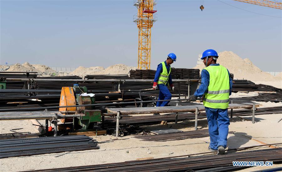 Constructors work at the construction site of the China-UAE Industrial Capacity Cooperation Demonstration Zone, in Abu Dhabi, the United Arab Emirates (UAE), on July 16, 2018. The China-UAE Industrial Capacity Cooperation Demonstration Zone is located in the Khalifa Industrial Zone and covers an area of 2.2 square kilometers, with the main layout of new energy, aluminium products processing, business logistics, petrochemical, food processing and other industries. (Xinhua/Wu Huiwo)