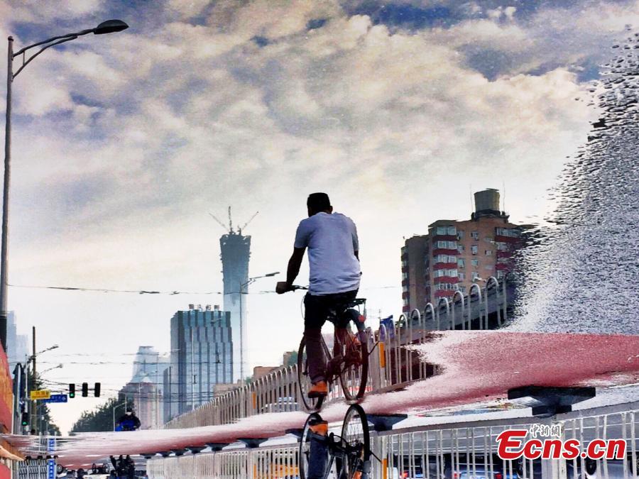 ‘Road to the Future,’ photo by Shuijingdoujiao.

Twenty winning photos in the first stage of a contest to mark the 40th anniversary of China’s reform and opening-up, guided by the Central Cyberspace Affairs Commission and organized by China News Service and its online photo section.