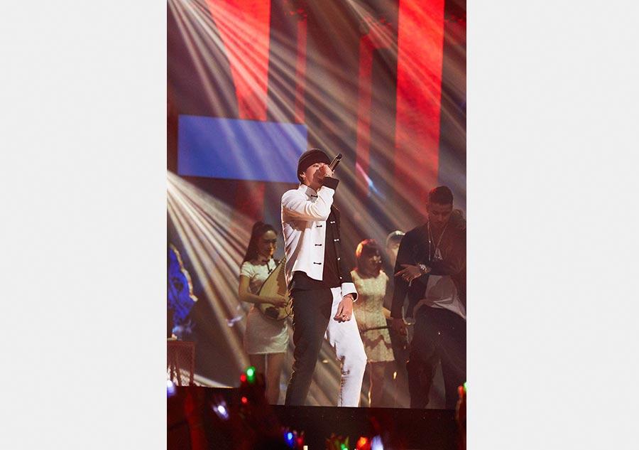 Singer-songwriter Kris Wu performs his song Young OG, combining traditional Chinese musical instruments with hip hop music, at the season 2 of the The Rap of China, a reality show on hip-hop by streaming media platform iQiyi. (Photo provided to China Daily)
