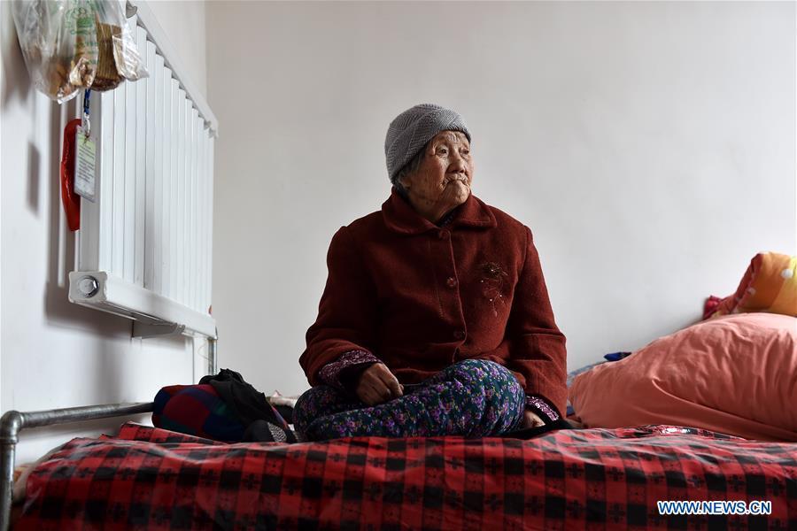 Zhao Lanying sits on the bed on March 9, 2016. Zhao died at the age of 93 in Xinyi Village of Wuxiang County, north China\'s Shanxi Province, April 7, 2016. In June of 1941, Zhao and two sisters were captured by Japanese invaders. About two months later, her family took her home. Zhao spent three month to recover from physical injury but remained emotionally-wounded for her lifetime. Women forced into sexual slavery by the Imperial Japanese Army before and during World War II were called \