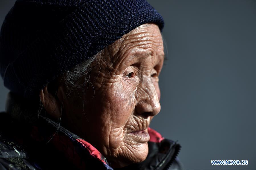 90-year-old Pian Huanying is seen at home in Nuanquan Village of Qinxian County, north China\'s Shanxi Province, March 19, 2018. In the autumn of 1942, Pian has been abducted and abused by Japanese invaders. She was rescued by her relatives about 20 days later. After that, she was captured for three times. Women forced into sexual slavery by the Imperial Japanese Army before and during World War II were called \