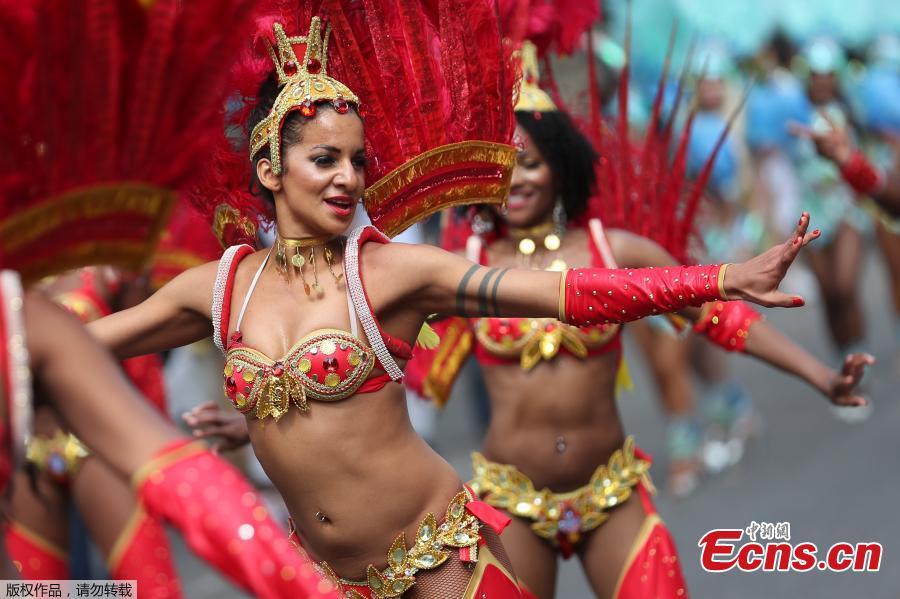Revelers take part in the Notting Hill Carnival in London, Britain August 27, 2018. The Notting Hill Carnival is a symbol of interracial tolerance which dates back to the 1960s and celebrates the Afro-Caribbean community. (Photo/Agencies)