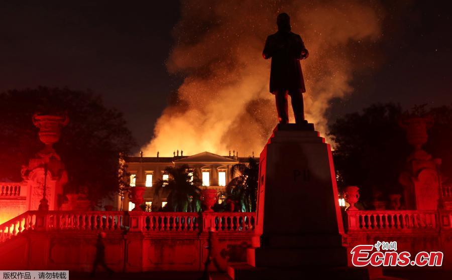 Firefighters try to extinguish a fire at the National Museum of Brazil in Rio de Janeiro, Brazil September 2, 2018. (Photo/Agencies)

A massive fire raced through Brazil\'s 200-year-old National Museum in Rio de Janeiro on Sunday, probably destroying its collection of more than 20 million items, ranging from archeological finds to historical memorabilia. The destruction of the building was an \