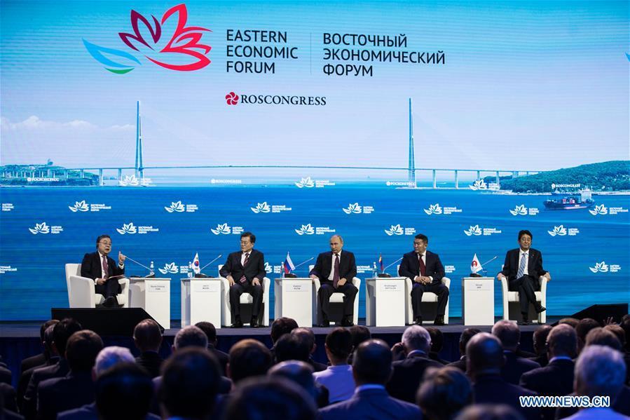 South Korean President Moon Jae-in, Russian President Vladimir Putin, Mongolian President Khaltmaa Battulga, Japanese Prime Minister Shinzo Abe (2nd L-R) attend the plenary session of the third Eastern Economic Forum in Vladivostok, Russia, on Sept. 7, 2017. (Xinhua/Wu Zhuang)