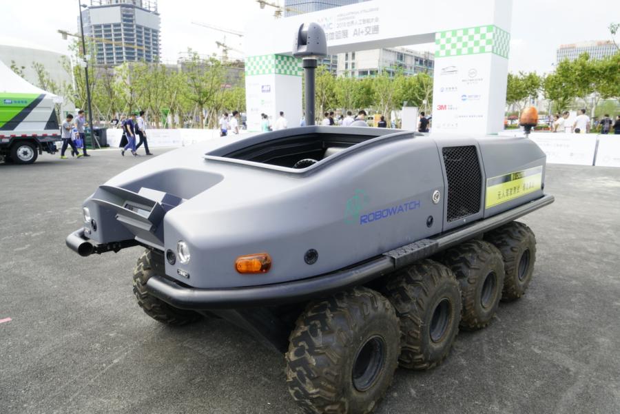Automated driving vehicles are displayed in the AI Park Interactive Displays section during the World Artificial Intelligence Conference 2018 in Shanghai on Sept 18. The types of vehicles on show include sedans, buses, sanitation trucks and delivery vehicles. (Photo provided to chinadaily.com.cn)
