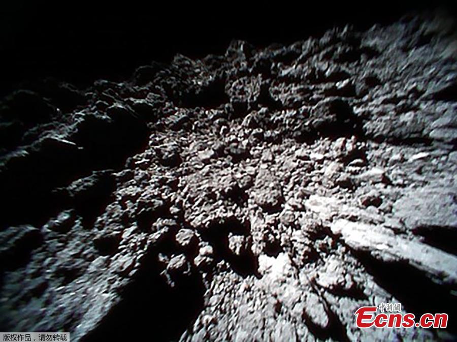 A handout photo made available by Japan Aerospace Exploration Agency (JAXA) shows an image of the surface of asteroid Ryugu, in space, Sept. 23, 2018, captured immediately before hop of Rover-1B. The MINERVA-II1 rovers, Rover-1A and Rover-1B, were deployed on Sept. 21 to explore the surface of asteroid Ryugu. (Photo/Agencies)