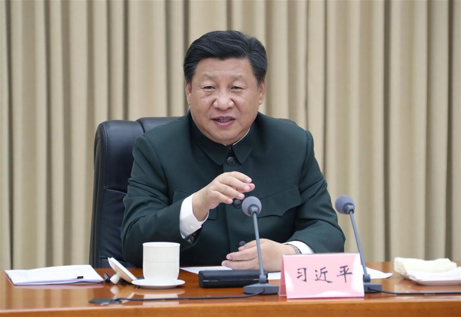 Chinese President Xi Jinping, also general secretary of the Communist Party of China (CPC) Central Committee and chairman of the Central Military Commission, listens to the work report of the 79th Group Army of the People\'s Liberation Army and delivers a speech on Sept. 27, 2018. Xi inspected the 79th Group Army of the People\'s Liberation Army and met with senior officers of troops stationed in northeast China\'s Liaoning Province from Sept. 27 to 28. (Xinhua/Li Gang)