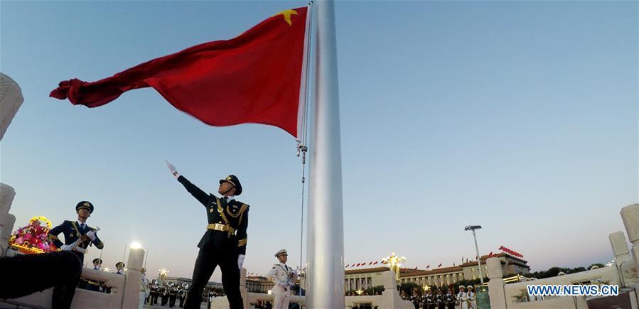 A national flag-raising ceremony is held to celebrate the National Day at the Tian\'anmen Square in central Beijing, capital of China, on Oct. 1, 2018, the 69th anniversary of the founding of the People\'s Republic of China. (Xinhua/Ju Zhenhua)