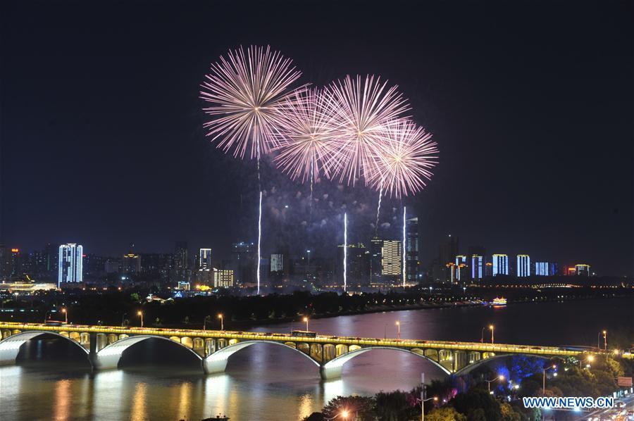Fireworks are seen during the celebration of China\'s National Day, in Hong Kong, south China, Oct. 1, 2018. People celebrate the 69th anniversary of the founding of the People\'s Republic of China on Monday. (Xinhua/Li Gang)