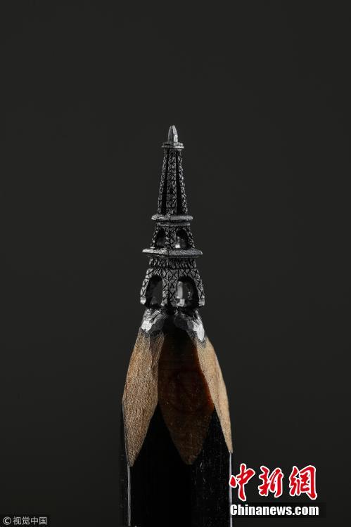 A artwork carved from the tip of pencil lead, by Turkish artist Nihat Ozcan. Ozcan is one of the rare pencil carving artists in the world. He carves figures in miniature on the tips of pencils. (Photo/CFP)