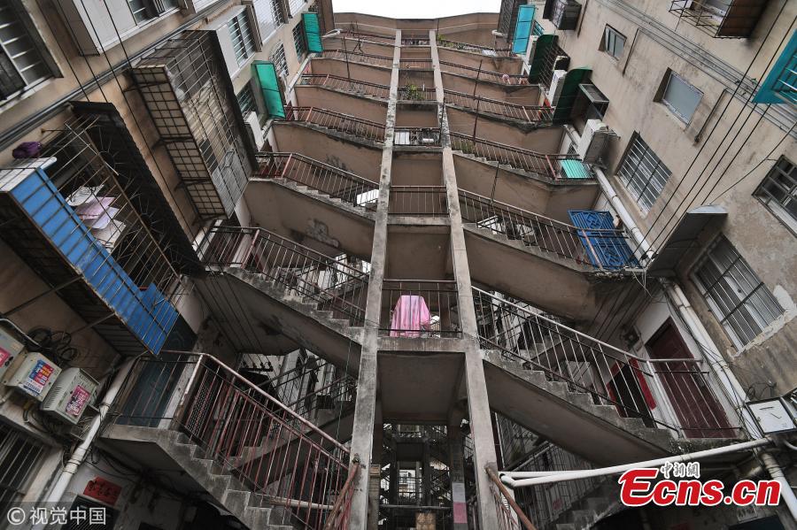 Two residential buildings share a stairwell in a community in Nanning City, South China’s Guangxi Zhuang Autonomous Region, Oct. 11, 2018. (Photo/VCG)