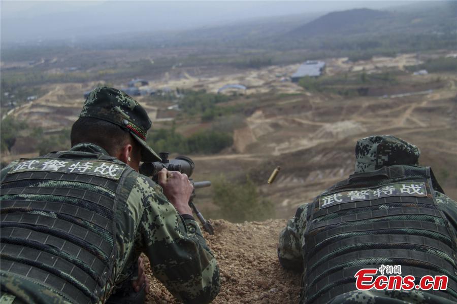 Snipers from a special unit of the Chinese People\'s Armed Police Force sharp their skills during a training at Songshan Mountain, Central China’s Henan province. (Photo: China News Service/ Zhao Hongtao)