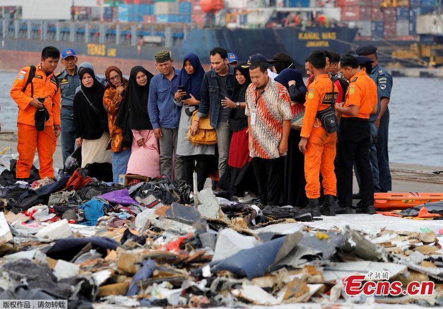 Families of passengers of Lion Air flight JT610 stand as they look at the belongings of the passengers at Tanjung Priok port in Jakarta, Indonesia, October 31, 2018. (Photo/Agencies)