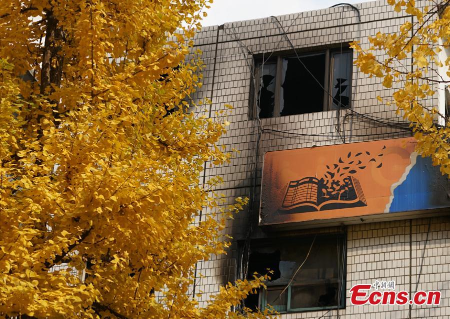 A fire at a low-cost dormitory-style housing facility in central Seoul, South Korea, is put out Nov. 9, 2018. The fire killed at least seven people and injured 11. Authorities are investigating possible safety lapses in the building.(Photo: China News Service/Zeng Nai)