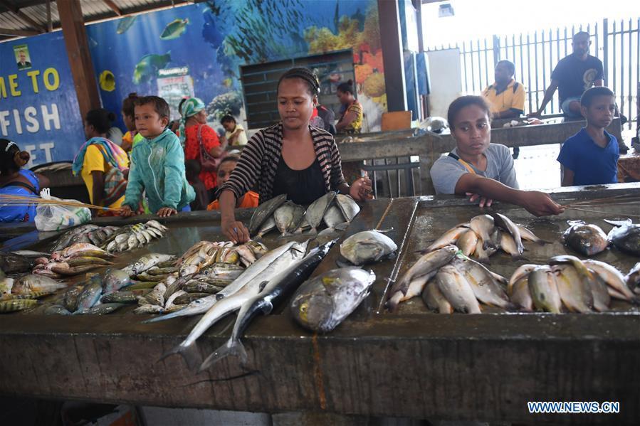 Photo taken on Nov. 11, 2018 shows a fish market in Port Moresby, Papua New Guinea. Leaders from the Asia-Pacific economies are gathering in Port Moresby, the capital of Papua New Guinea for the Asia-Pacific Economic Cooperation (APEC) Leaders\' Week on Nov. 12-18. (Xinhua/Lui Siu Wai)