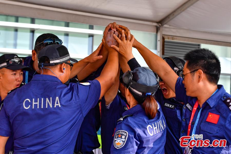 The second USIP World Police Service Pistol Shooting Championship takes place at the Guangdong provincial police training center in Foshan, Guangdong province on November 14, 2018. A total of 256 police from nearly 70 countries and regions across the world registered for the contest. (Photo: China News Service/ Chen Jimin)