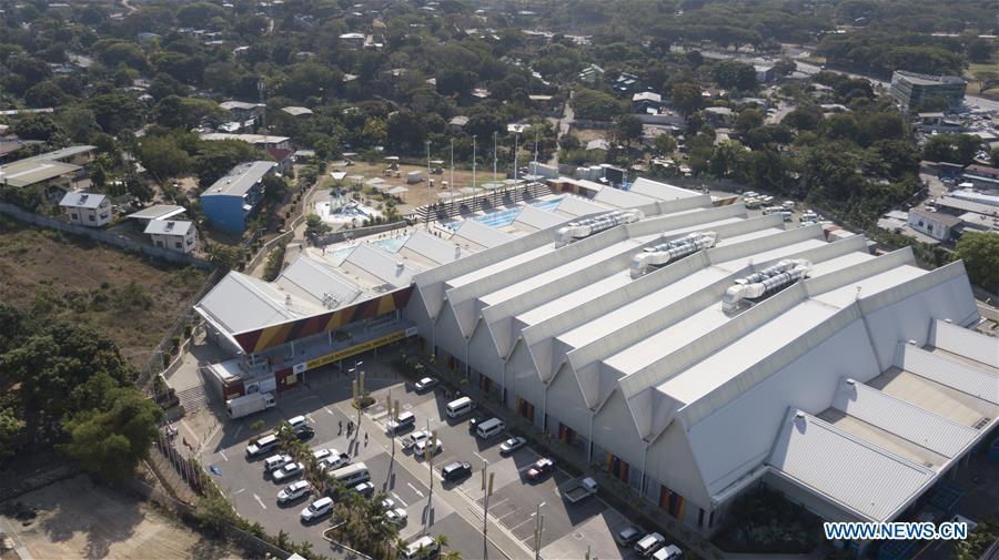 Aerial photo taken on Nov. 9, 2018 shows the APEC 2018 International Media Centre in Port Moresby, Papua New Guinea (PNG). PNG, comprising about 600 small islands, is the host of the APEC meetings this year. The media centre opened to journalists on Monday and will be in use until Nov. 18. (Xinhua/Lui Siu Wai)