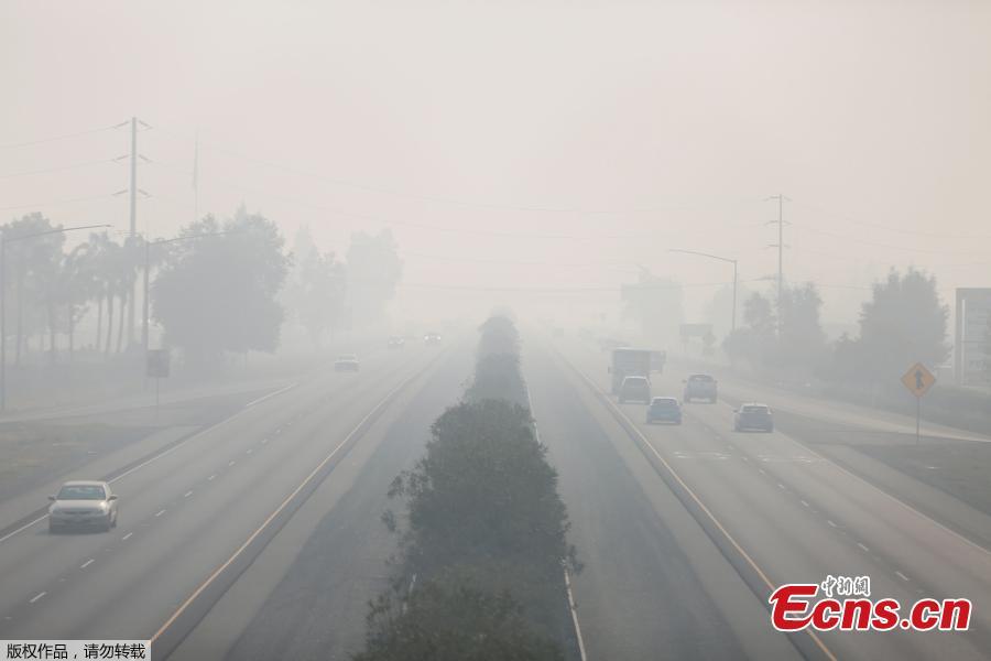 Smoke from the Camp Fire blankets Highway 99 in Chico, California, U.S., November 18, 2018. (Photo/Agencies)