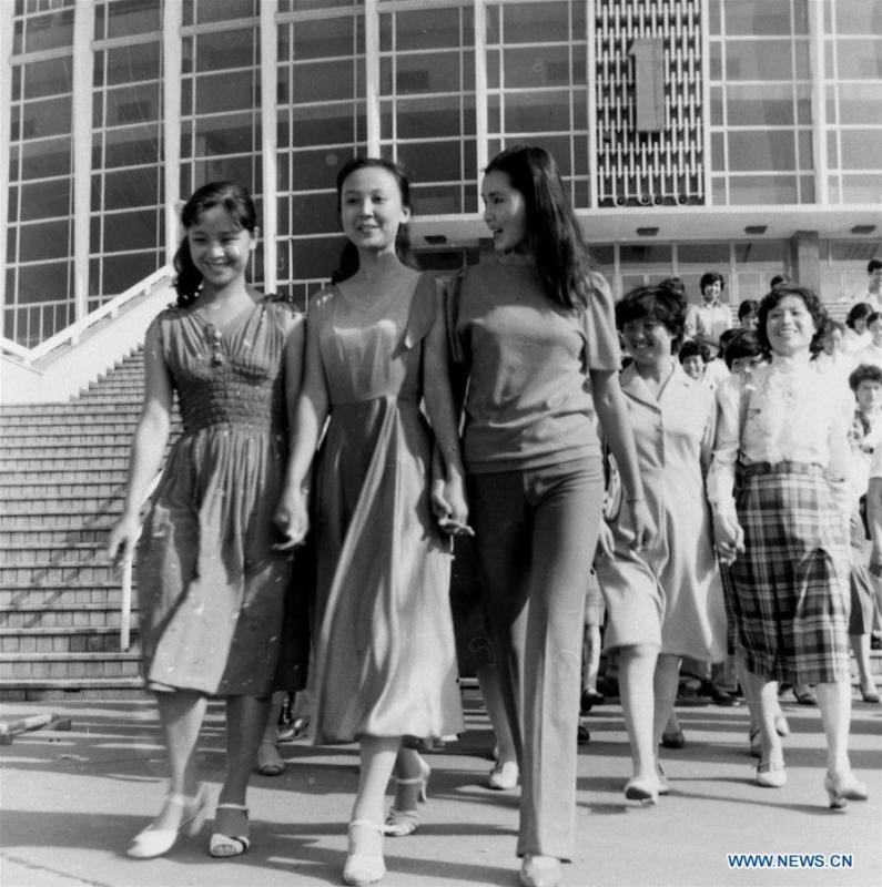 File photo shows a stage photo of a movie in 1984, which tells a story about female model worker and beautiful skirt. From 1978 when China started its reform and opening-up policy, a door to the outside world has been opened. Along with the imported commodities, fashion ideas inevitably slipped into China and since then the country, which was somewhat lack of fashion diversity, started its journey to pursue fashions. Over the past four decades, the thirst for beauty has driven Chinese people to pursue every possible fashionable element. The change first came with dress when colorful and diversified clothing prevailed as against the former dominant blue and grey. For a time, men and women raced to hairdressers\' just for trendy hairdos. Eating McDonald\'s or western cuisine even once was regarded as a fashionable thing. However, the most conspicuous change is that Chinese people have become more inclusive and they tend to accept new fashions, styles and concepts. China nowadays is dazzling the world not only on the fashion stage but in many other fields. Changes in fashions, as a profile of society, has well interpreted the benefits to people brought by China\'s reform and opening-up policy. (Xinhua)