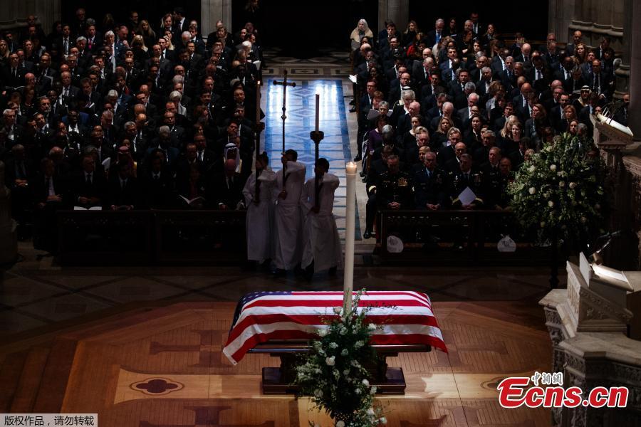 The flag-draped casket of former President George H.W. Bush during a State Funeral at the National Cathedral, Wednesday, Dec. 5, 2018, in Washington.(Photo/Agencies)
In laughter and tears, the United States held a state funeral here Wednesday for the 41st President George H.W. Bush, who has been widely mourned and praised as a good leader and a devoted person with a \