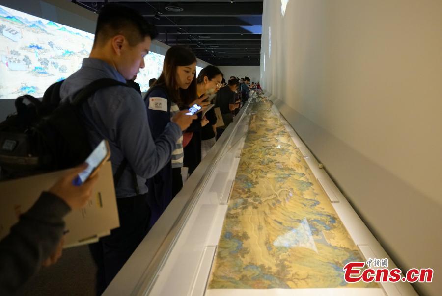 Visitors take photos of the \