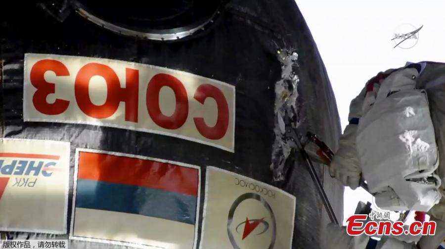 Two Russian cosmonauts have ventured outside the International Space Station today to inspect a section of a Russian spacecraft where a small hole was spotted. The mysterious leak was discovered on August 30 in the Russian Soyuz craft which is attached to the ISS. It was initially believed to have been caused by a small meteorite and astronauts used tape to seal the leak after it caused a minor loss of pressure. Now, the two astronauts have confirmed the hole is safe - and the craft will be used again. (Photo/Agencies)