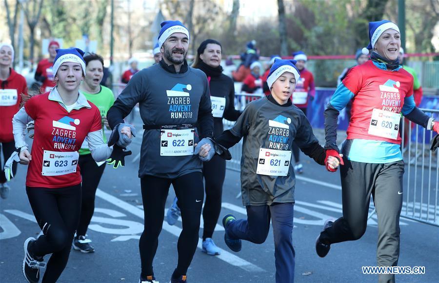 People take part in the third edition of Zagreb Advent Run in Zagreb, Croatia, on Dec. 16, 2018. More than 2,500 participants took part in the race on Sunday to raise funds for fighting diabetes. (Xinhua/Sanjin Strukic)