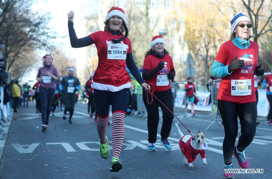 People take part in the third edition of Zagreb Advent Run in Zagreb, Croatia, on Dec. 16, 2018. More than 2,500 participants took part in the race on Sunday to raise funds for fighting diabetes. (Xinhua/Sanjin Strukic)