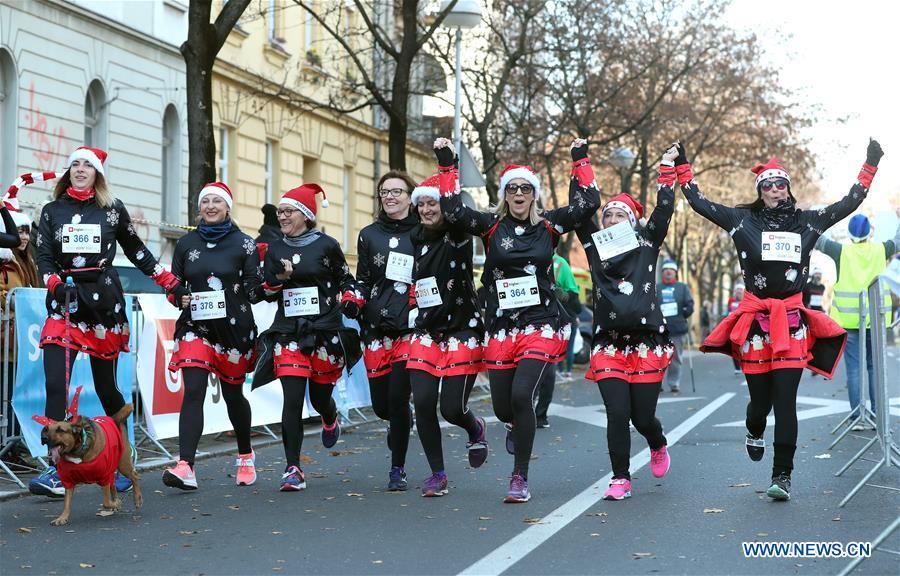 People take part in the third edition of Zagreb Advent Run in Zagreb, Croatia, on Dec. 16, 2018. More than 2,500 participants took part in the race on Sunday to raise funds for fighting diabetes. (Xinhua/Sanjin Strukic)