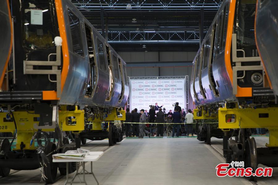 CRRC, a leading manufacturer of locomotives and rolling stock in China, rolls out the first train from its factory in Springfield, Massachusetts, the United States. The Chinese company supplies trains to the Massachusetts state transportation authority for use on Boston\'s Red and Orange subway lines. (Photo: China News Service/Liao Pan)