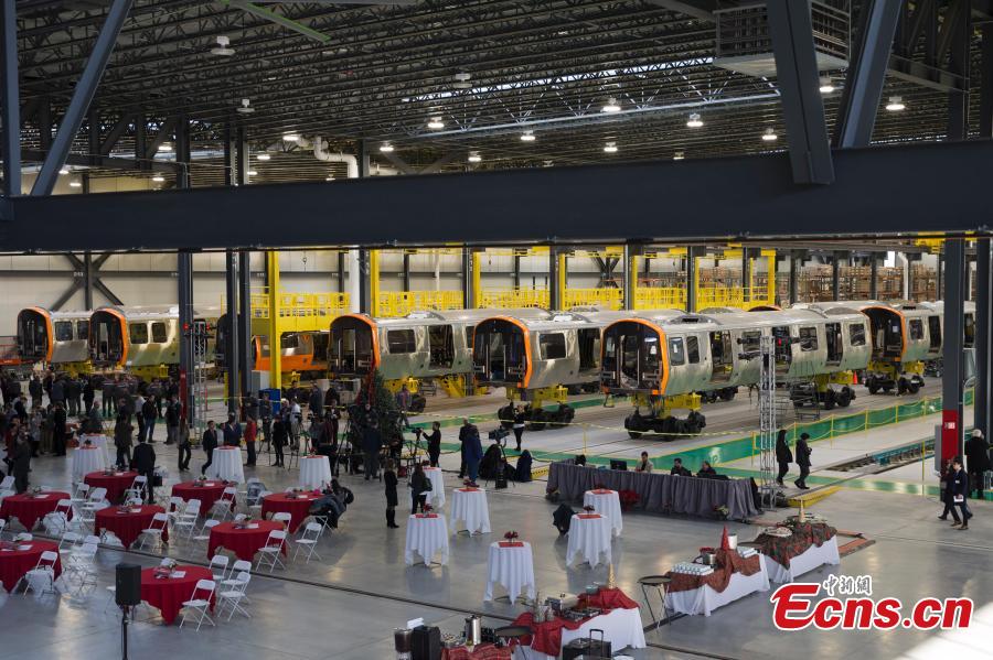 CRRC, a leading manufacturer of locomotives and rolling stock in China, rolls out the first train from its factory in Springfield, Massachusetts, the United States. The Chinese company supplies trains to the Massachusetts state transportation authority for use on Boston\'s Red and Orange subway lines. (Photo: China News Service/Liao Pan)