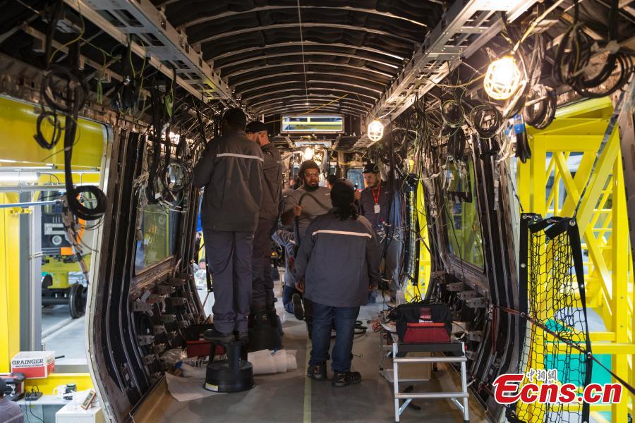 CRRC, a leading manufacturer of locomotives and rolling stock in China, rolls out the first train from its factory in Springfield, Massachusetts, the United States. The Chinese company supplies trains to the Massachusetts state transportation authority for use on Boston\'s Red and Orange subway lines. (Photo: China News Service/Liao Pan)