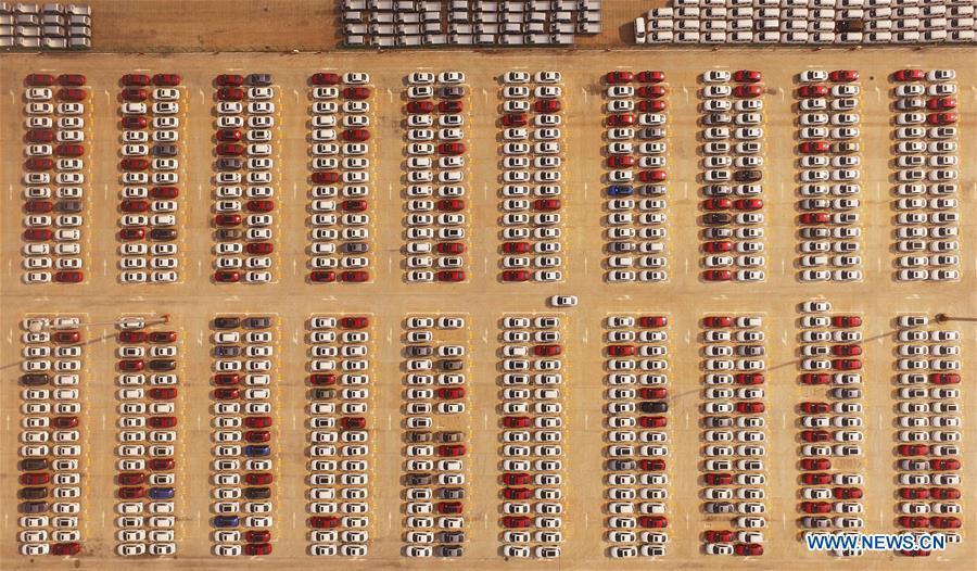 Cars are seen at Guoyuan Port in Chongqing Municipality, southwest China, Aug. 20, 2018. Colors make our world bright and beautiful. In 2018, Xinhua photographers across China explored views from the sky with drones. Here are these drone photos with amazing colors. (Xinhua/Wang Quanchao)