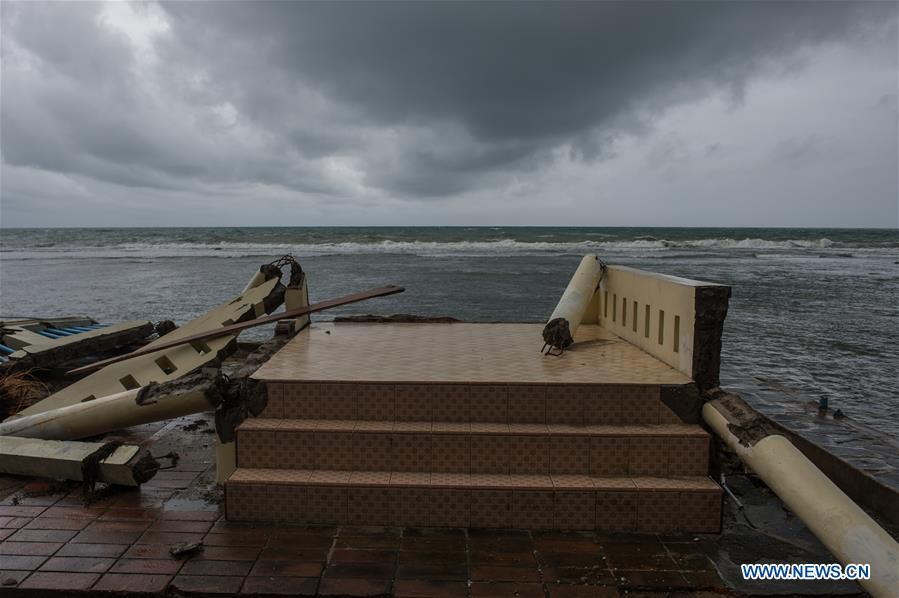 Vehicles are seen among the debris after a tsunami hit Sunda Strait in Pandeglang, Banten province, in Indonesia, Dec. 23, 2018. The total casualty of a tsunami triggered by the eruption of Krakatau Child volcano has increased to 222 people in coastal areas of Sunda Strait of western Indonesia, disaster agency official said here on Sunday. The catastrophe killed at least 222 people, wounded at least 843 ones and collapsed a total of 556 houses and nine hotels, and caused damages to scores of ships. (Xinhua/Veri Sanovri)