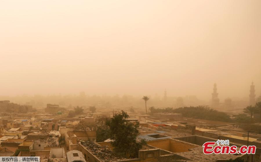 General view of the City of the Dead, known as al-Arafa, during a sandstorm in Cairo, Egypt, Jan. 16, 2019. Egypt\'s capital Cairo and some of its port cities were hit by a severe sandstorm, with strong winds and heavy dust forcing the closure of several ports. (Photo/Agencies)