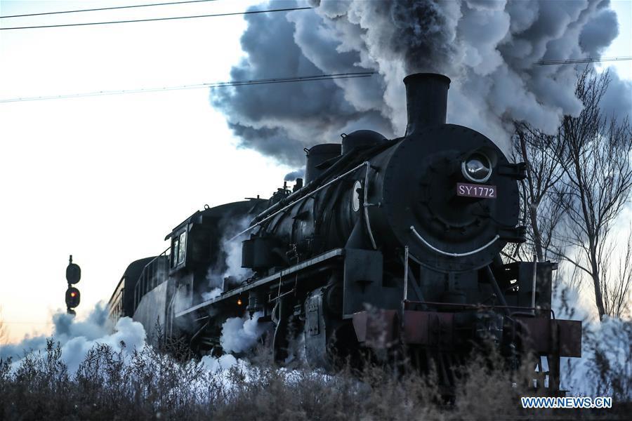 Photo taken on Jan. 17, 2019 shows a steam locomotive heading to the steam locomotive museum of Tiefa Energy Co., Ltd from Diaobingshan Station, northeast China\'s Liaoning Province. A 5-day steam locomotive tourism event kicked off in Diaobingshan on Thursday. Tourists can visit the steam locomotive museum, take pictures of steam locomotives and watch exhibitions during the event. (Xinhua/Pan Yulong)