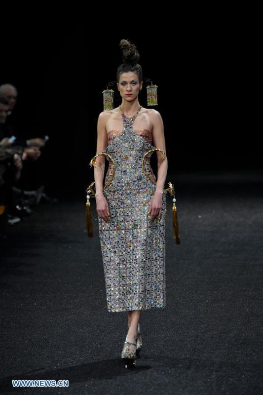 A model presents a creation of Guo Pei during the Haute Couture 2019 Spring/Summer collection shows in Paris, France, on Jan. 23, 2019. (Xinhua/Piero Biasion)