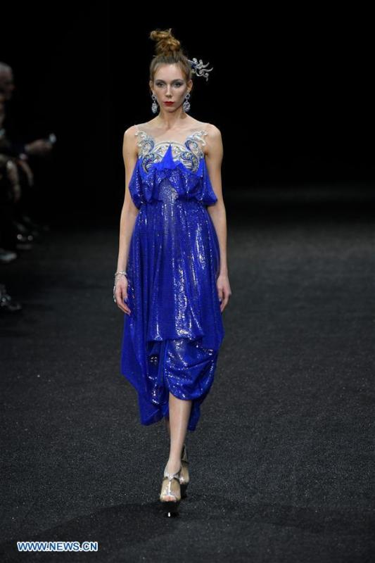A model presents a creation of Guo Pei during the Haute Couture 2019 Spring/Summer collection shows in Paris, France, on Jan. 23, 2019. (Xinhua/Piero Biasion)