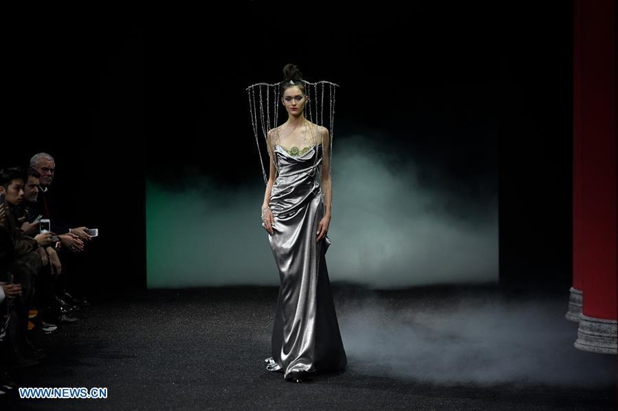 A model presents a creation of Guo Pei during the Haute Couture 2019 Spring/Summer collection shows in Paris, France, on Jan. 23, 2019. (Xinhua/Piero Biasion)