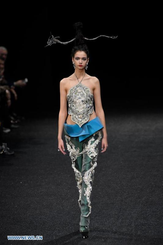 A model presents a creation of Guo Pei during the Haute Couture 2019 Spring/Summer collection shows in Paris, France, on Jan. 23, 2019. (Xinhua/Piero Biasion)