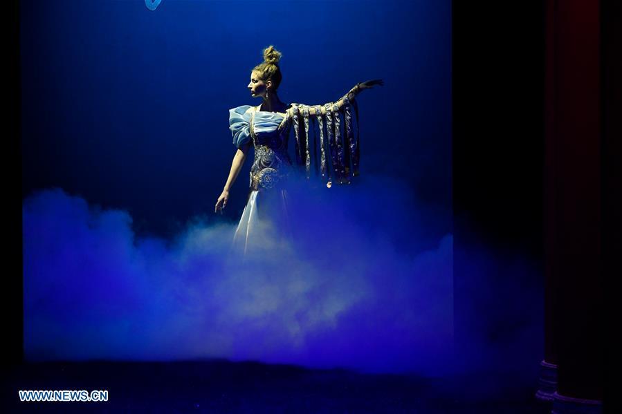 A model presents a creation of Guo Pei during the Haute Couture 2019 Spring/Summer collection shows in Paris, France, on Jan. 23, 2019. (Xinhua/Piero Biasion)