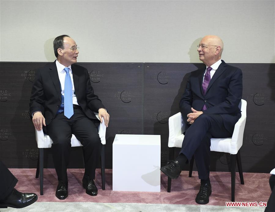 Chinese Vice President Wang Qishan (L) meets with World Economic Forum (WEF) Founder and Executive Chairman Klaus Schwab during the 2019 Annual Meeting of the World Economic Forum in Davos, Switzerland. Wang delivered a speech titled \