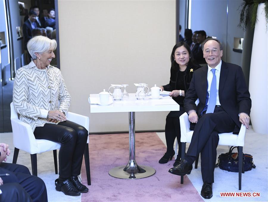 Chinese Vice President Wang Qishan (R) meets with International Monetary Fund (IMF) Managing Director Christine Lagarde during the 2019 Annual Meeting of the World Economic Forum in Davos, Switzerland. Wang delivered a speech titled \