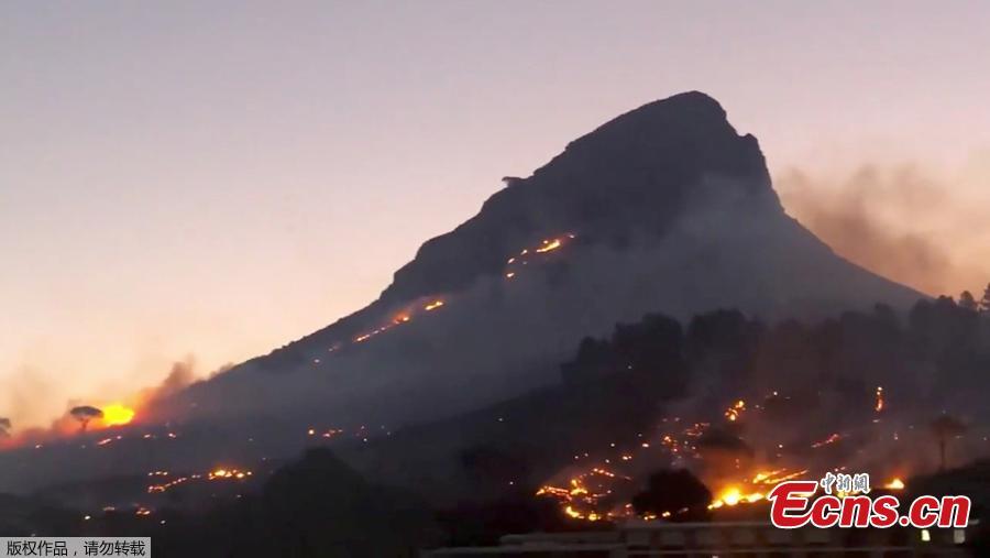 Smoke rises from a burning mountainside in Cape Town, South Africa, January 27, 2019, in this picture obtained from social media. (Photo/Agencies)