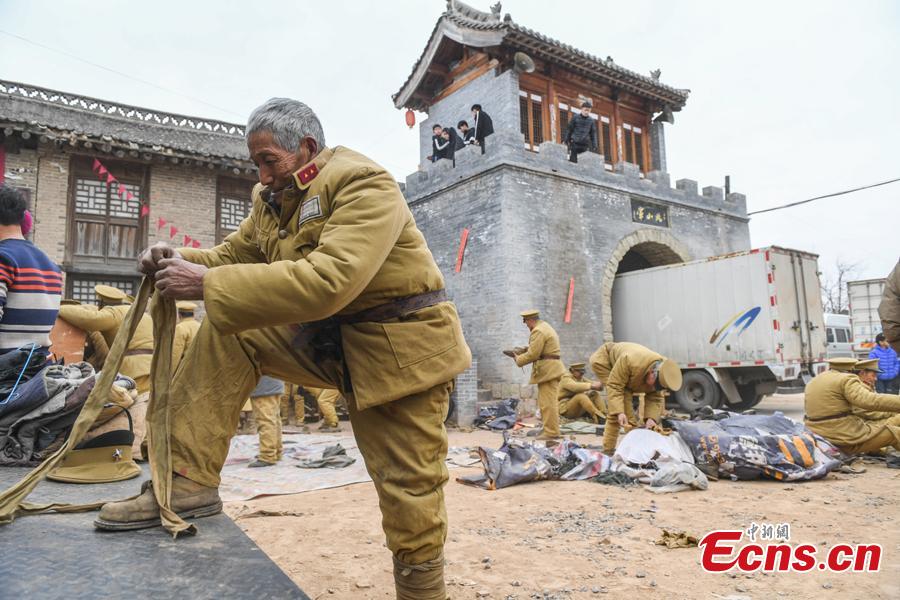 Li Tieliang, 69, and other farmers work as extras in a TV drama being shot in Beishanyun Village in Yushe County, North China’s Shanxi Province, Jan. 24, 2019. The village has more than 30 well-preserved buildings from the Ming and Qing dynasties, making it a good location to shoot historical film and TV dramas. In recent years, many locals have migrated to other places, while some remaining farmers have found work as extras. Li and his wife survive by farming, while their children work in other cities. Li now works part-time as an extra and earns about 100 yuan ($14) a day. (Photo: China News Service/Wu Junjie)