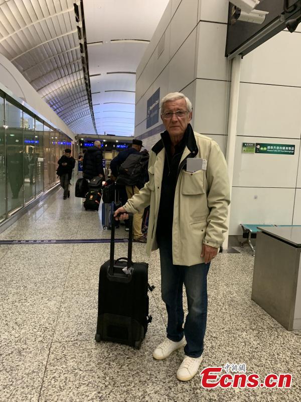 Marcello Lippi, the 70-year-old Italian legendary coach, is seen at Baiyun International Airport in Guangzhou City, Guangdong Province, Jan. 29, 2019. He\'s leaving the country as his contract as China\'s head coach ends after the AFC Asian Cup tour. (Photo/China News Service)