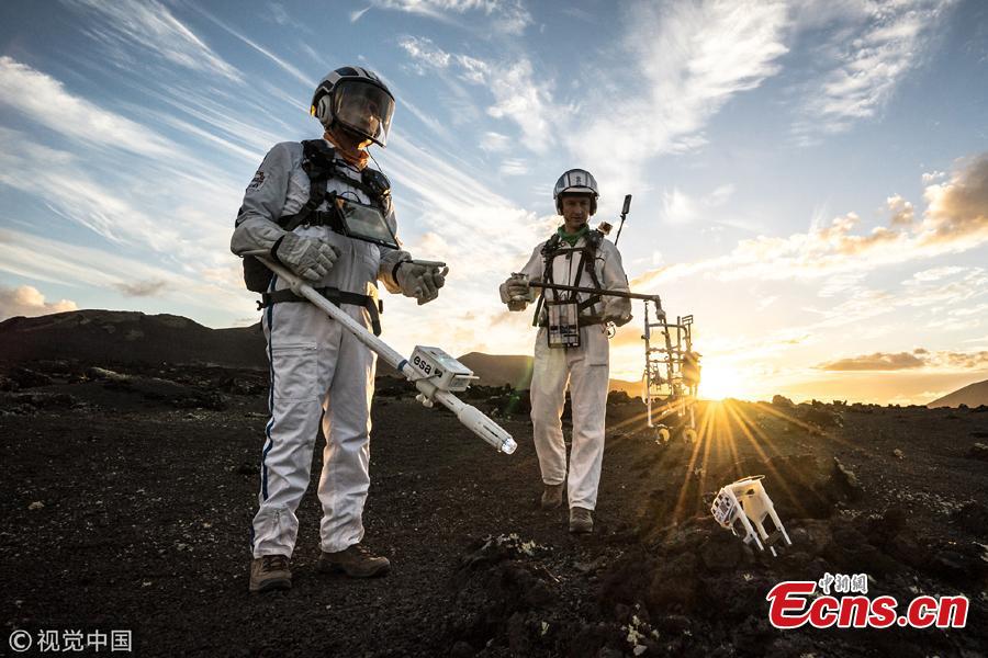 The Pangaea-X crew explore the barren and dry landscape of Lanzarote in the Canary Islands, Spain. Pangaea-X of the European Space Agency (ESA) is a test campaign that brings together geology, high-tech survey equipment and space exploration. Astronauts, scientists, operations experts and instrumentation engineers work side-by-side to advance European know-how of integrated human and robotics mission operations. (Photo/Agencies)