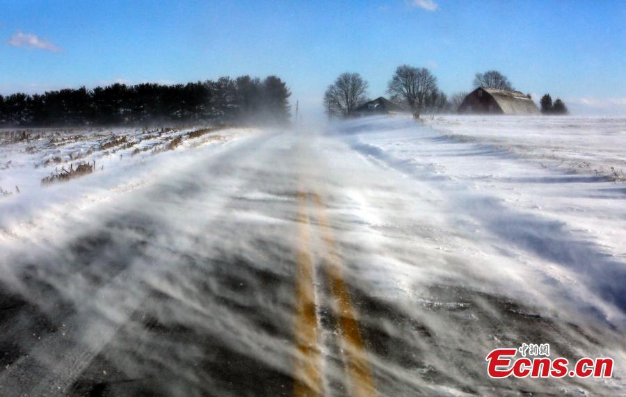 Drifting snow obscures a road near Mount Joy in Lancaster County, Pa., Jan. 30, 2019. A bitter deep freeze is moving into the Northeast from the Midwest, sending temperatures plummeting and making road conditions dangerous. (Photo/Agencies)