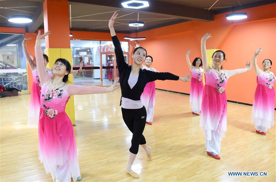 A dance instructor (C) and trainees rehearse dance at a cultural center in Nanhe County, north China\'s Hebei Province, Jan. 30, 2019. More than 2000 people have participated in art training programs at a cultural center in Nanhe County as a way to enrich their life. (Xinhua/Zhu Xudong)