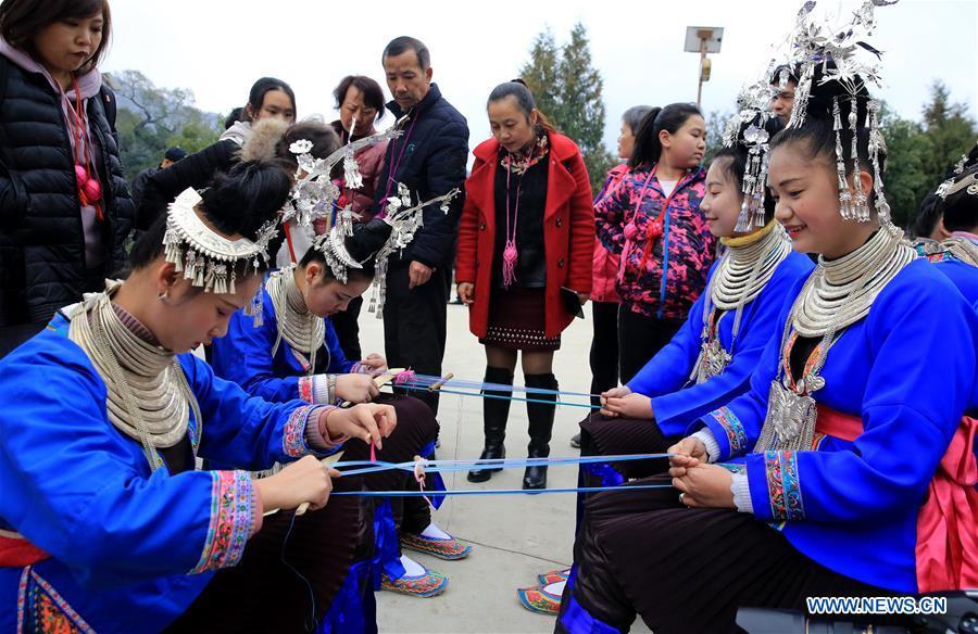 People of Dong ethnic group perform during the Spring Festival holiday in Dingdong Village of Qiandongnan Miao and Dong Autonomous Prefecture, southwest China\'s Guizhou Province, Feb. 8, 2019. (Xinhua/Long Tao)